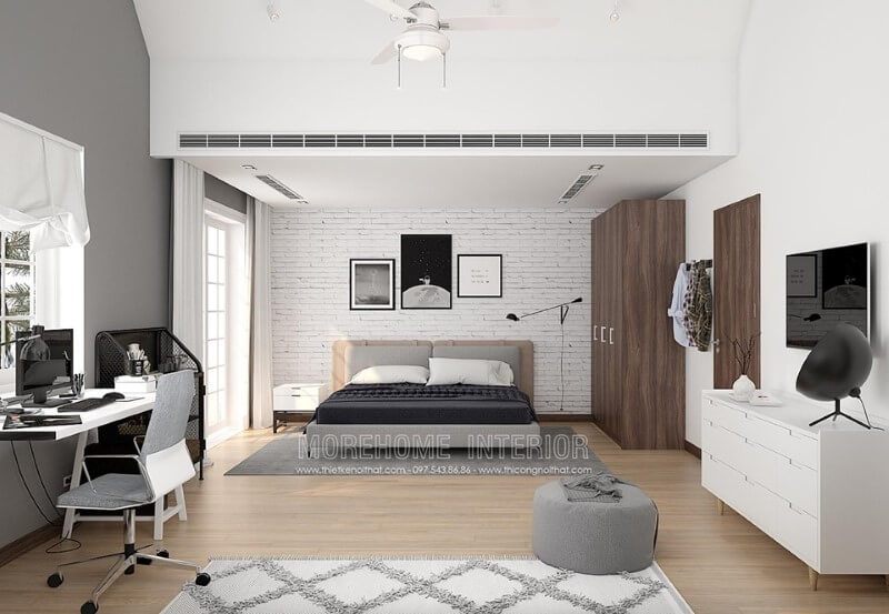 Sofa phòng ngủ có bề mặt bọc vải nhỏ xinh màu ghi xám thanh lịch, tạo nên một cảm giác chân thành và ấm áp hơn.